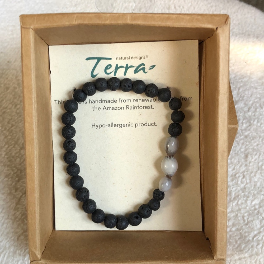 New in box. Terra handmade, sustainable, essential oil seed bracelet. One size.